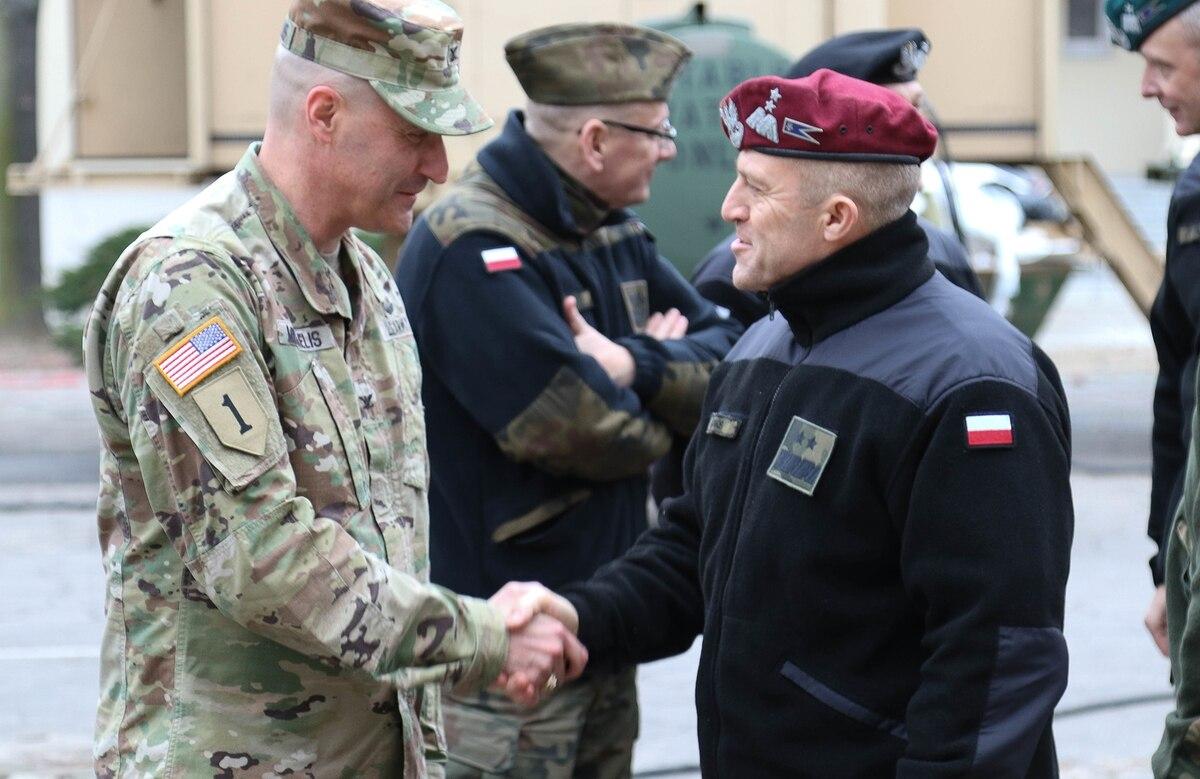 Col. Patrick Michaelis, commander of the Mission Command Element in Poznan, Poland, left, shakes hands with Maj. Gen. Adam Joks, deputy chief of the General Staff of the Polish armed forces, at the MCE Feb. 14, 2019. (Spc. Polish officer appointed deputy commander of US Army V Corps under exchange deal