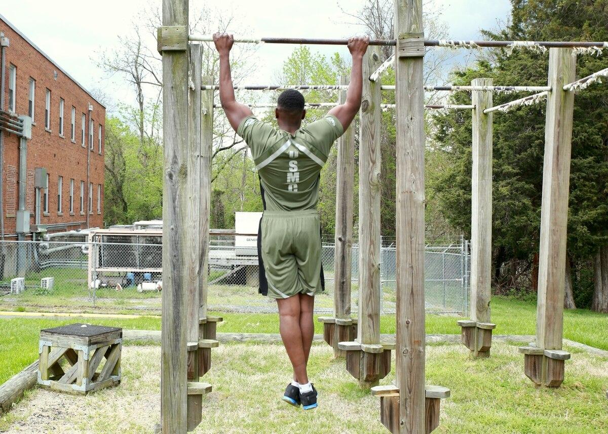 Capt. Donovan Holloway, an intelligence officer at Marine Corps Systems Command, demonstrates a prototype version of the new physical training uniform. (Tonya Smith/Marine Corps) Marines: This might be your new physical training uniform