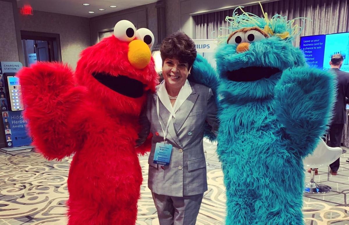Patricia Barron, pictured here with Elmo and Rosita, was on the advisory committee for Sesame Workshop's programs to support military families. (Courtesy of Patricia Barron) Family policy appointee will bring more military family voices to DoD, including her own