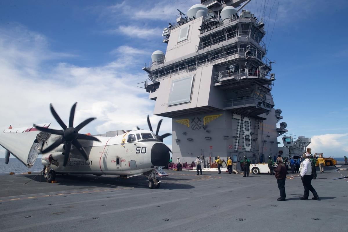 A C-2A Greyhound powers down its engines on the flight deck of the aircraft carrier Gerald R. Ford in September 2020. Ford is on track to deploy in 2022. (MC3 Zack Guth/Navy) Aircraft carrier Gerald Ford finishes post-delivery tests and trials