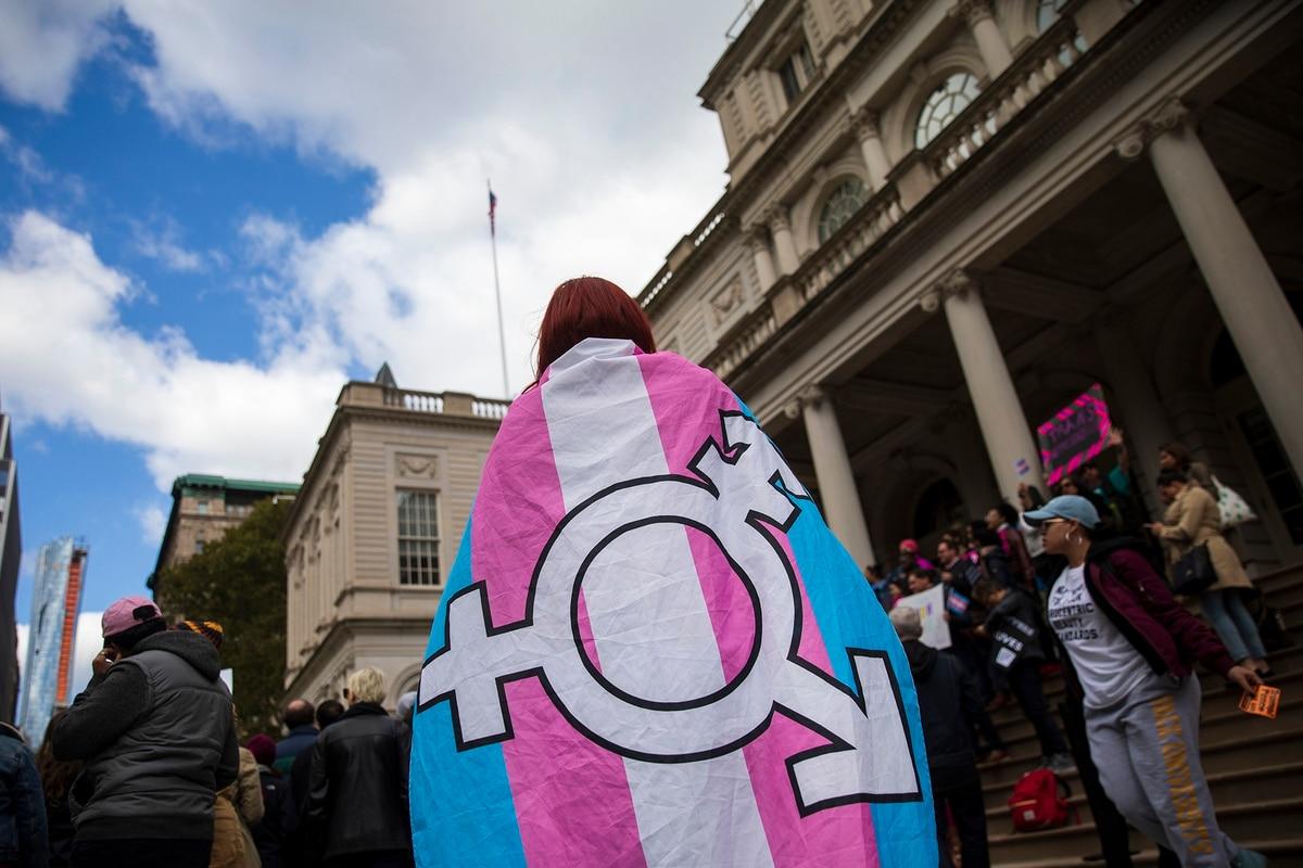 LGBT activists rally in support of transgender people on the steps of New York City Hall on Oct. 24, 2018. (Drew Angerer/Getty Images) We must push toward protecting LGBTQ service members at home