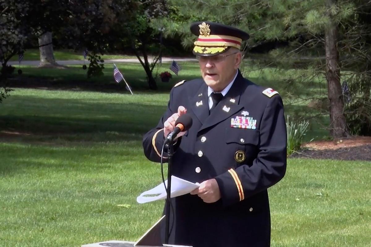 In this frame grab from video provided by Hudson Community Television, retired Army Lt. Col. Barnard Kemter taps the microphone after organizers turned off the audio during his speech at a Memorial Day ceremony on May 31,  Veteran will get another chance to give censored Memorial Day speech