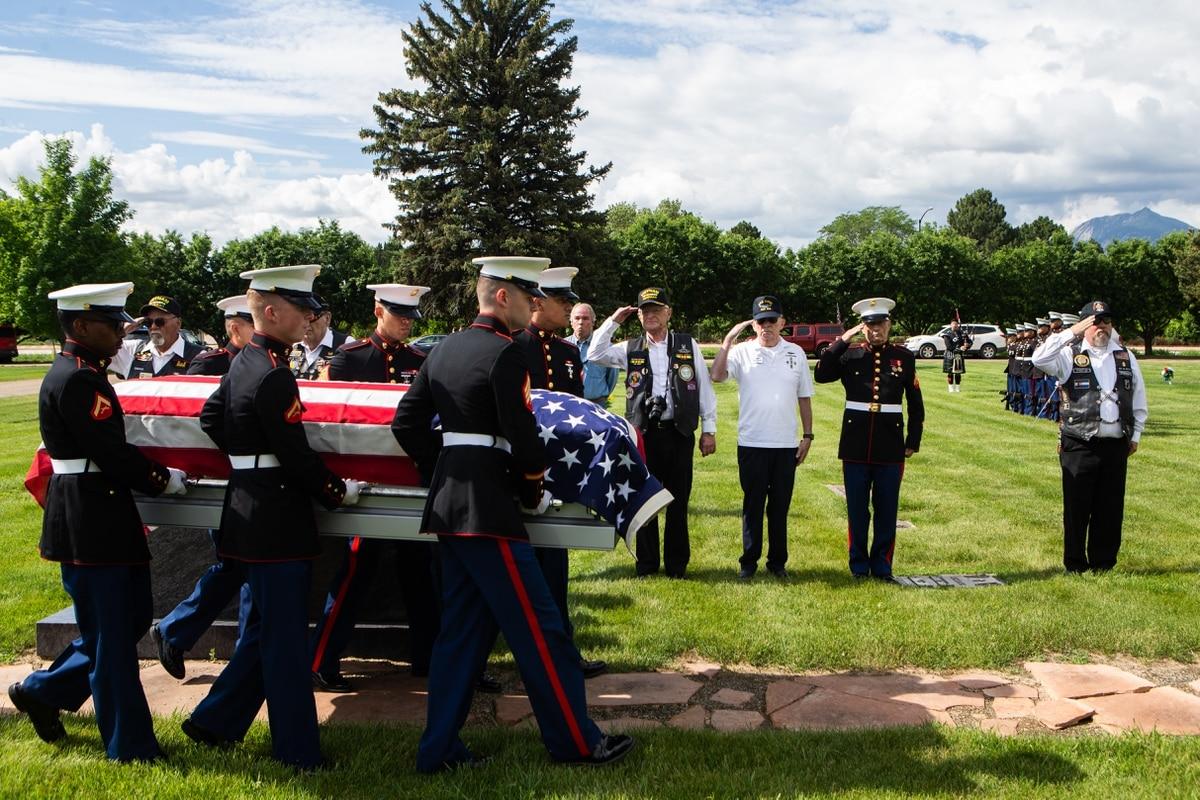 U.S. Marines with Combat Logistics Battalion 453, 4th Marine Logistics Group, transfer a casket containing the remains of U.S. Marine Corps Sgt. Donald D. Stoddard to the burial site at Mountain View Memorial Park in Bould 77 years later, a WW2 Marine is laid to rest