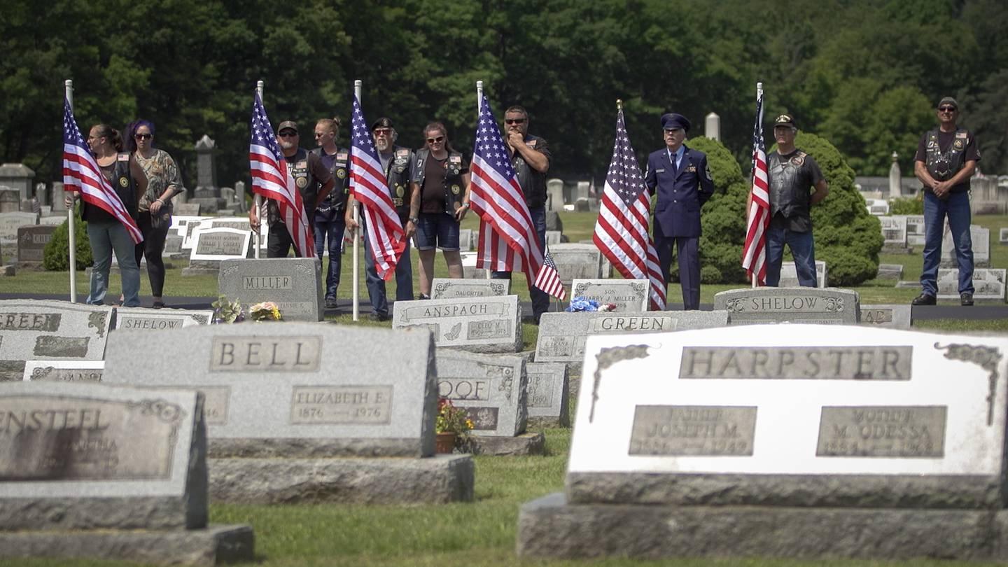Veterans hold American flags at the funeral for Cpl. Paul Wilkins at Logan Valley Cemetery Saturday, June 16, 2021 in Bellwood, Pa. The Army declared Wilkins missing in action in July 1950 during the Korean War, and his re Seven decades later, remains of soldier lost in Korean War returned home