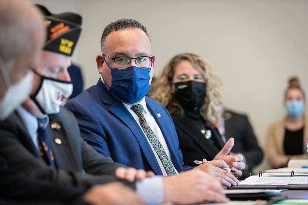 Education Secretary Miguel Cardona listens to leaders from local veterans groups during a roundtable at Manchester Community College in Manchester, N.H., on Nov. 4, 2021. (Department of Education) New loan forgiveness program needs veterans to help spread the news to peers, fellow troops