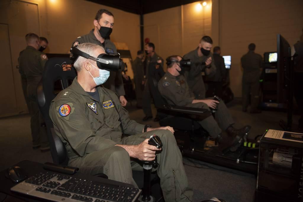 Commander of Naval Air Force Atlantic Rear Adm. John Meier conducts a virtual reality training flight during a Naval Aviation Next - Project Avenger demonstration at Training Air Wing 4, Naval Air Station Corpus Christi, o US Navy wants to create more lethal pilots for less money with simulators
