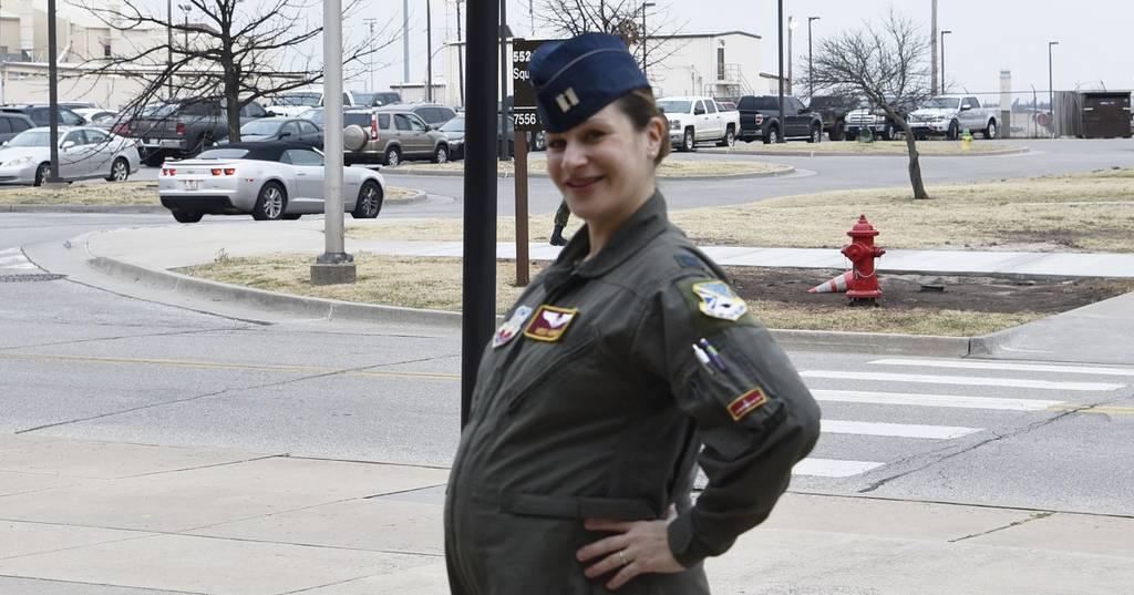 Then-expectant mother and Air Force Capt. Beatrice Horne helps the Air Force test out a new flight suit prototype that will accommodate pregnancy. (DoD) Two-piece flight suit, wrap dress on the horizon for pregnant airmen