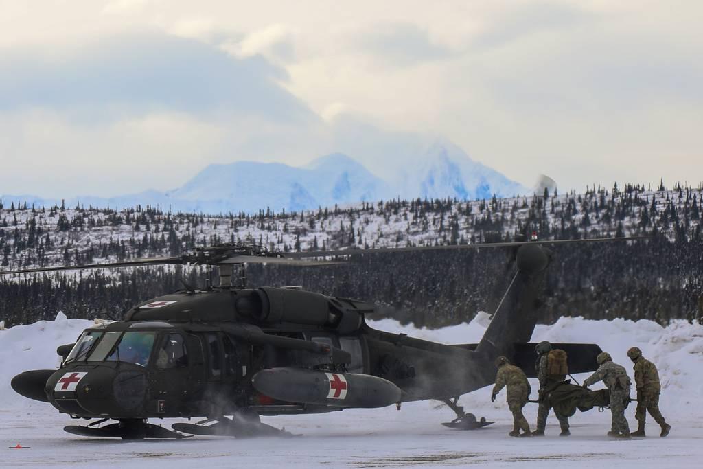Paratroopers from the 4th Infantry Brigade Combat Team, 25th Infantry Division, conduct MedEvac training near Fort Greely, Alaska, March 8, 2022. (Maj. Jason Welch/Army) CTC on ice: Army holds first Arctic brigade-level training rotation