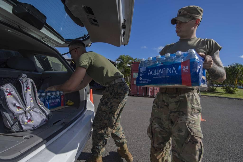 Service members help with distribution of water to residents during the Hawaii water water crisis. (Seaman Chris Thomas/Navy) JOINT BASE PEARL HARBOR-HICKAM, Hawaii (Feb. 8, 2022) – U.S. Marine Corps Lance Cpl. Owen Becker Headaches, diarrhea: New report details Hawaii military families’ symptoms after drinking fuel-tainted water