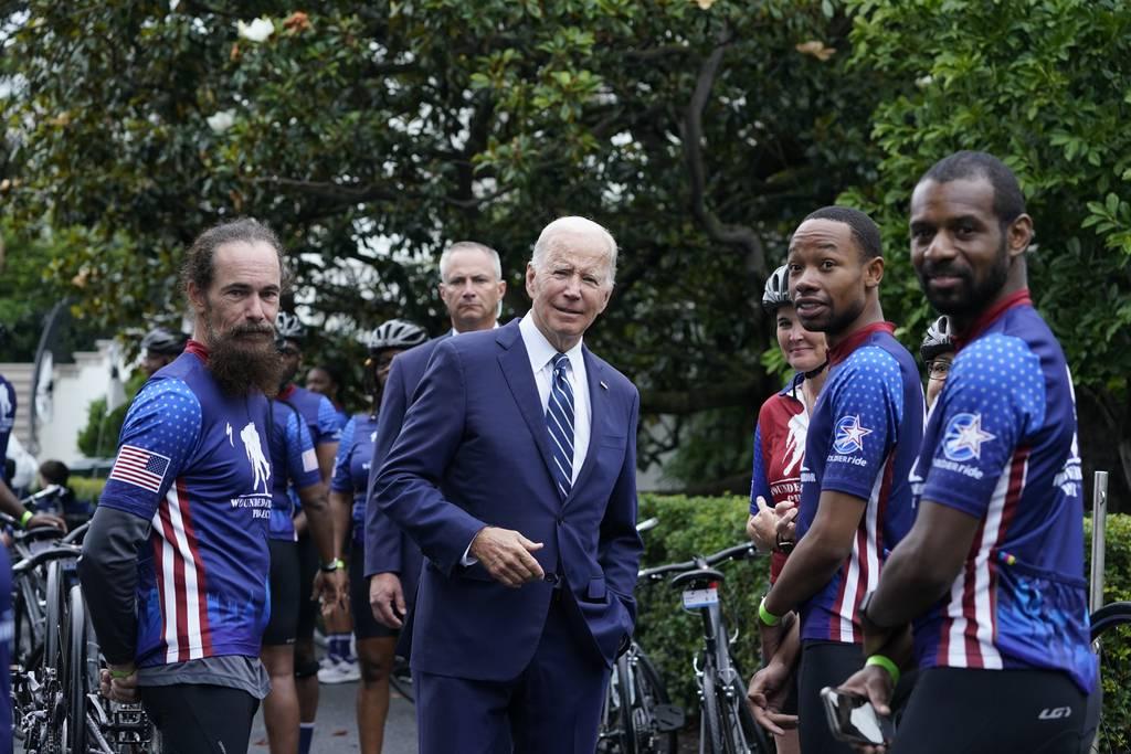 President Joe Biden talks to riders at the White House in Washington, Thursday, June 23, 2022, during an event to welcome wounded warriors, their caregivers and families to the White House as part of the annual Soldier Rid President Biden honors Wounded Warriors at soldier ride
