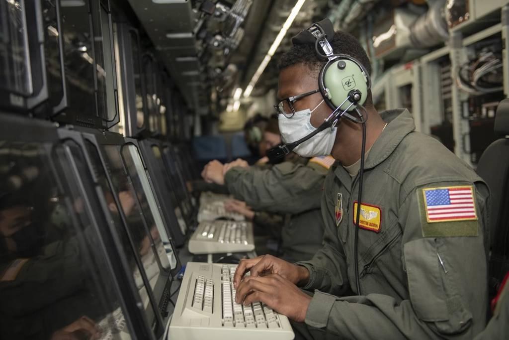 Senior Airman Christian Jackson, a cryptologic language analyst with the 97th Intelligence Squadron, sits at a computer simulating his in-flight duties at Lincoln Airport, Neb., May 11, 2021. Airmen from different Offutt A None of the US Air Force’s linguists spoke Ukrainian. Then Russia invaded.