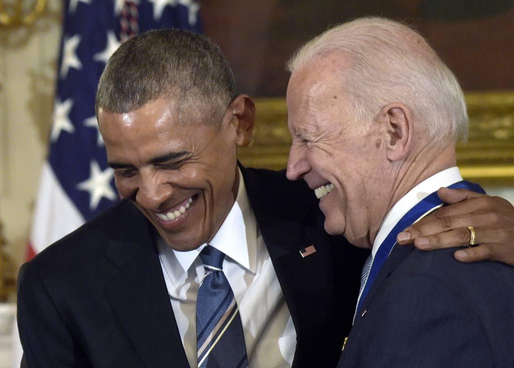 President Barack Obama laughs with Vice President Joe Biden during a ceremony in the White House where Obama presented Biden with the Presidential Medal of Freedom on Jan. 12, 2017. (Susan Walsh/AP) Navy veteran McCain, groundbreaking Air Force general among Medal of Freedom recipients
