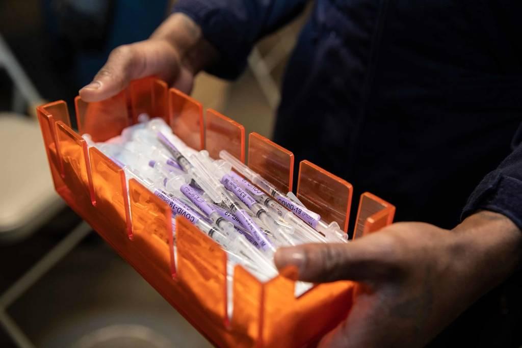 Covid-19 vaccine syringes are transported aboard the Wasp-class amphibious assault ship USS Kearsarge (LHD 3) March 31, 2021. (Mass Communication Specialist 3rd Class Jake Vermeulen/Navy) Federal judge temporarily halts Air Force’s COVID-19 vaccine mandate