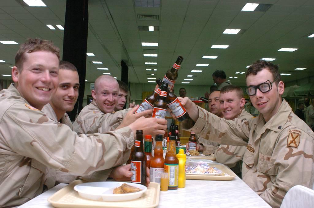 Soldiers from 2nd Battalion, 14th Infantry Regiment enjoy a frosty brew Super Bowl Sunday. All Soldiers were allowed to drink two beers during dinner. (DVIDS photo) Beer in the barracks? Army says ‘maybe’